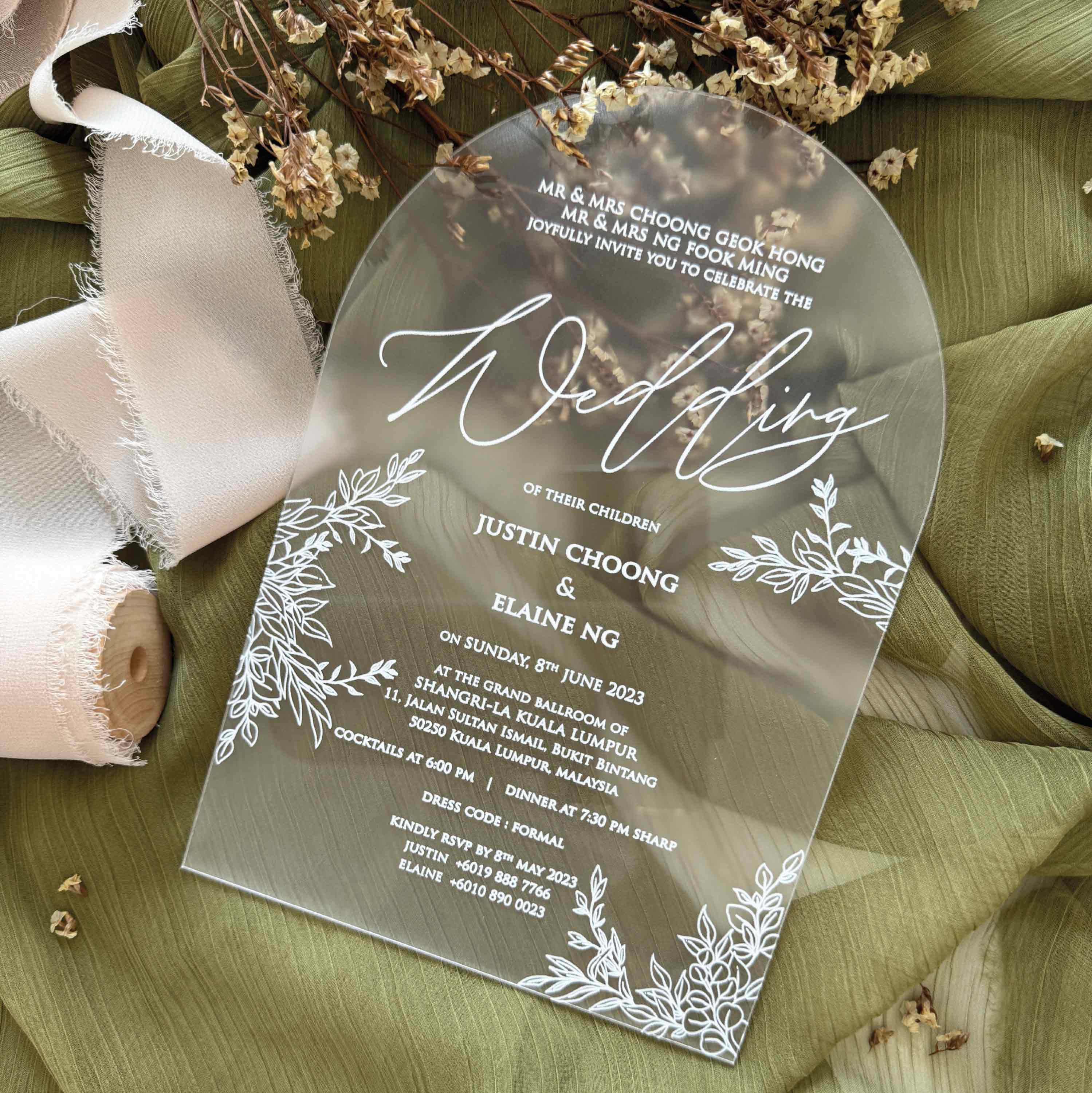 Frosted acrylic wedding invitation card with floral design printed in elegant white ink