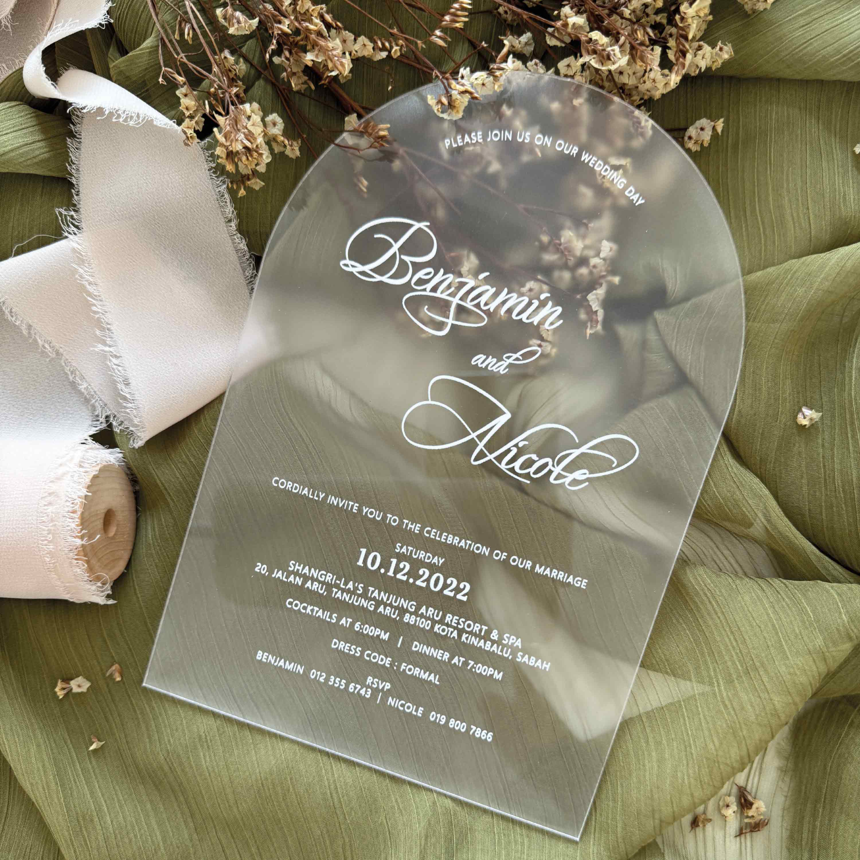 Frosted acrylic wedding invitation card with minimalist text printed in elegant white ink