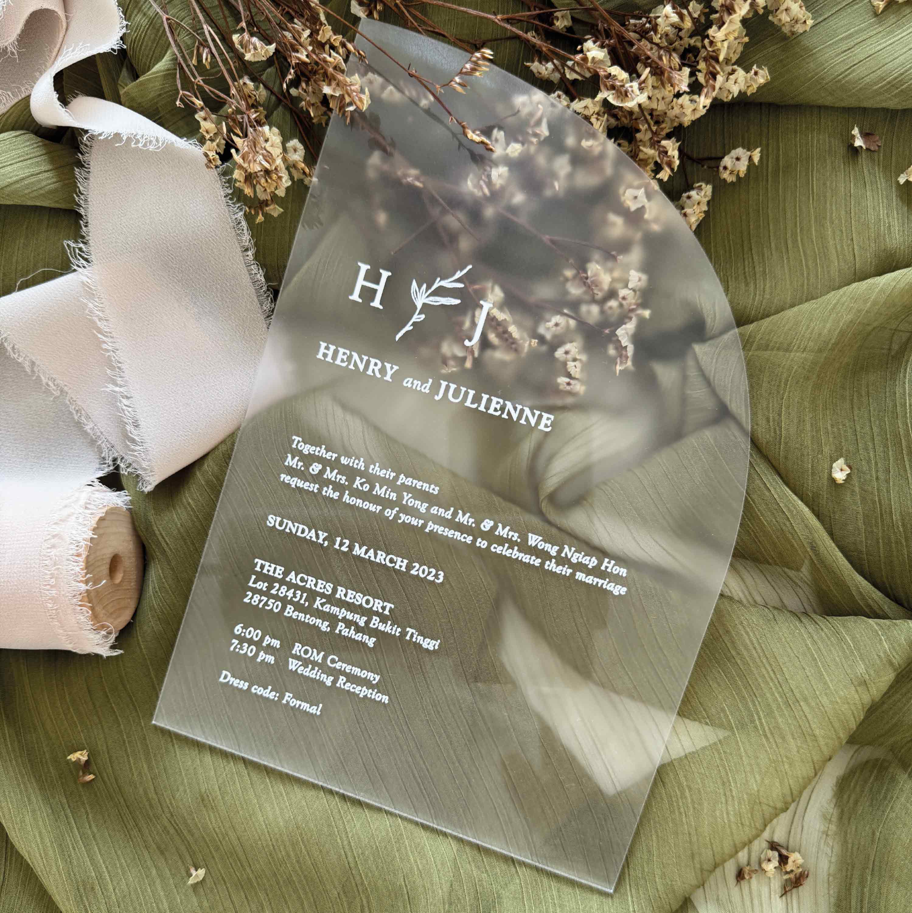 Minimalist Wedding invitation card with classic typography design laid on a dried baby breath for a great photo shoot