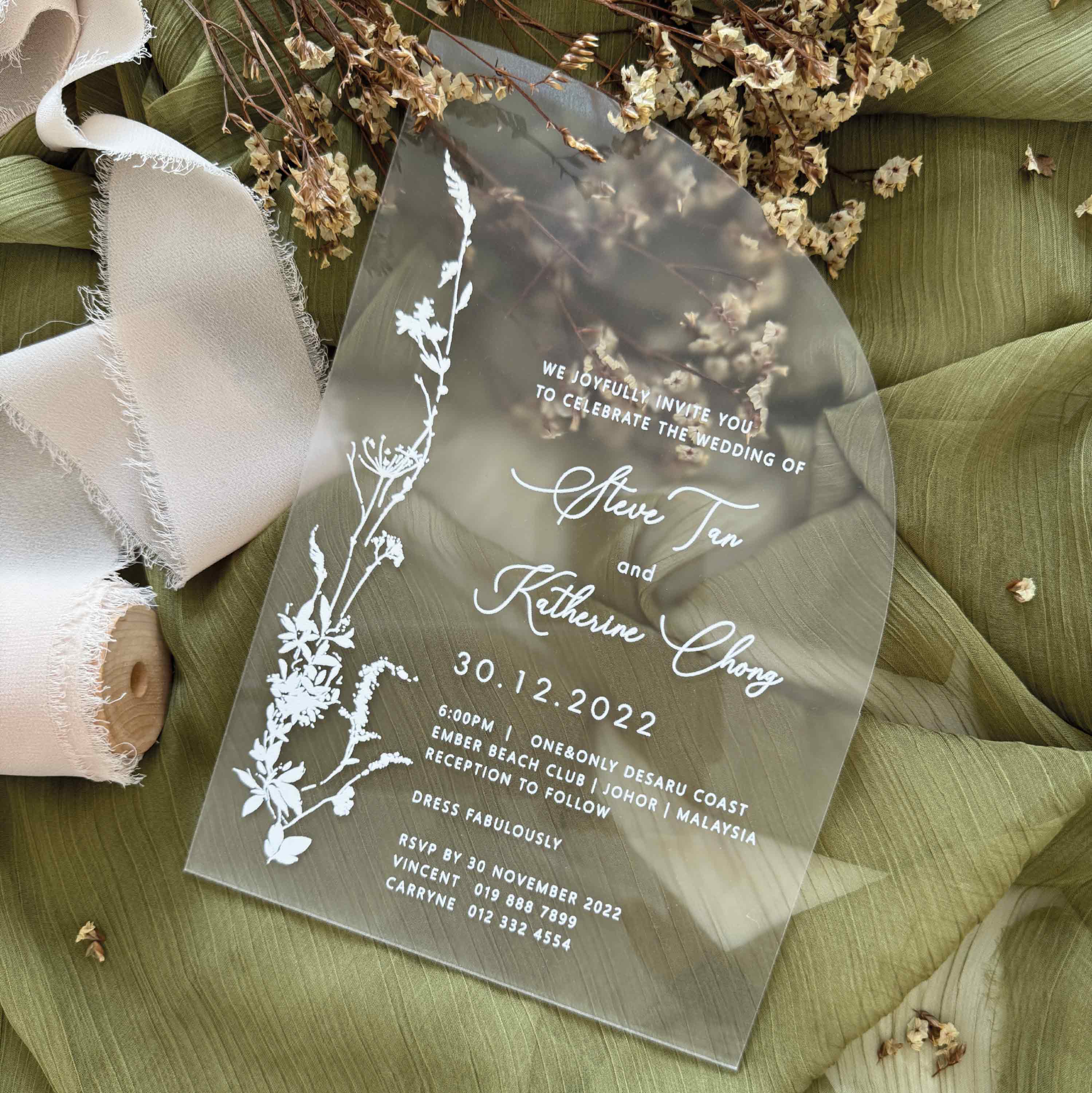 Minimalist Wedding invitation card with classic typography design laid on a dried baby breath for a great photo shoot