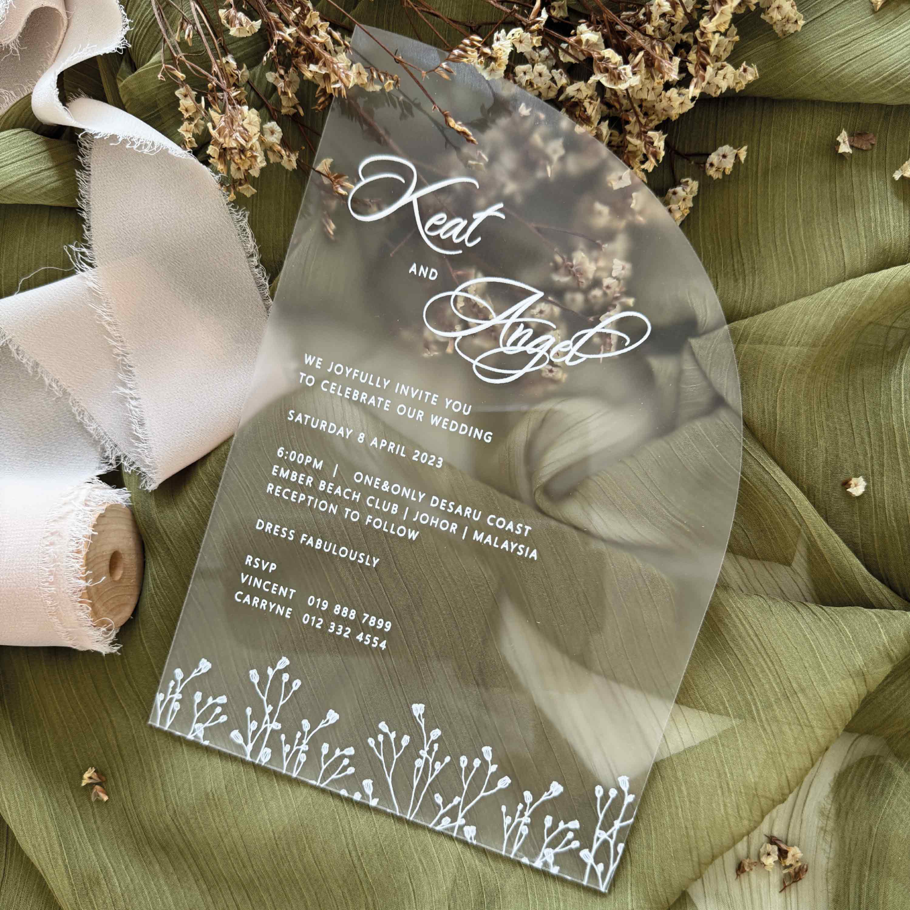 Minimalist Wedding invitation card with classic typography design laid on a dried baby breath for a great photo shoot