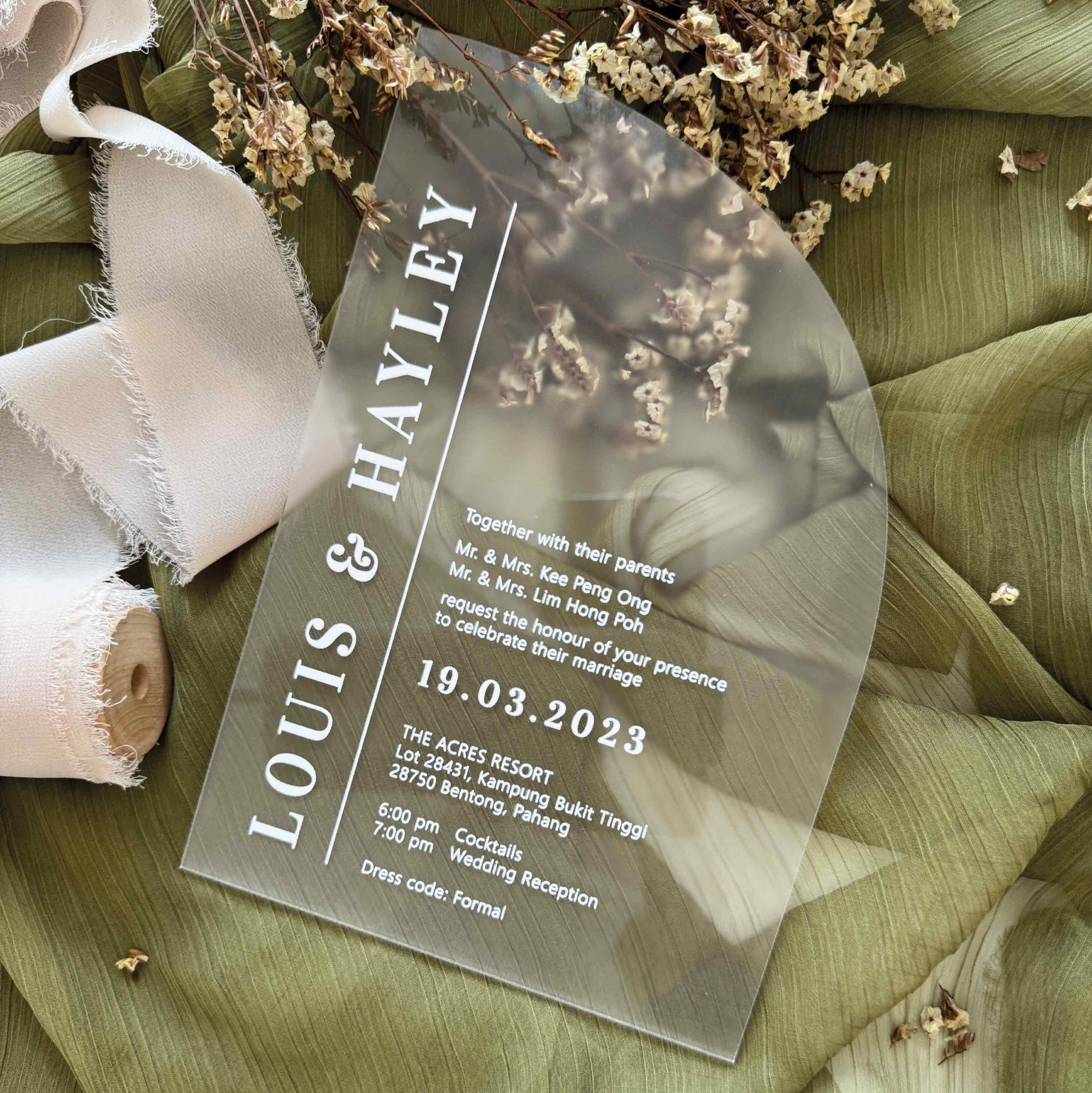 Minimalist Wedding invitation card with classic typography design laid on a dried baby breath for a great photo shoot