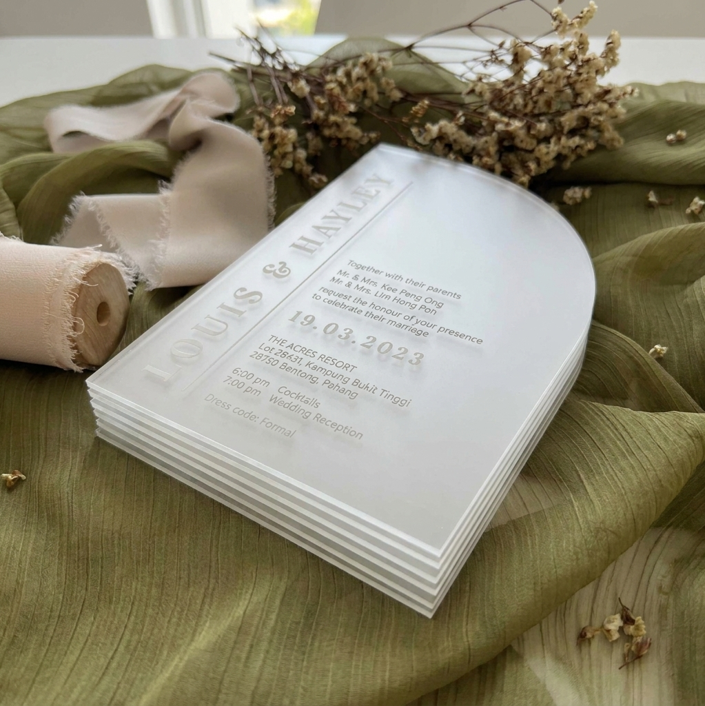 Minimalist Wedding invitation card with classic typography design laid on a dried baby breath for a great photo shoot
