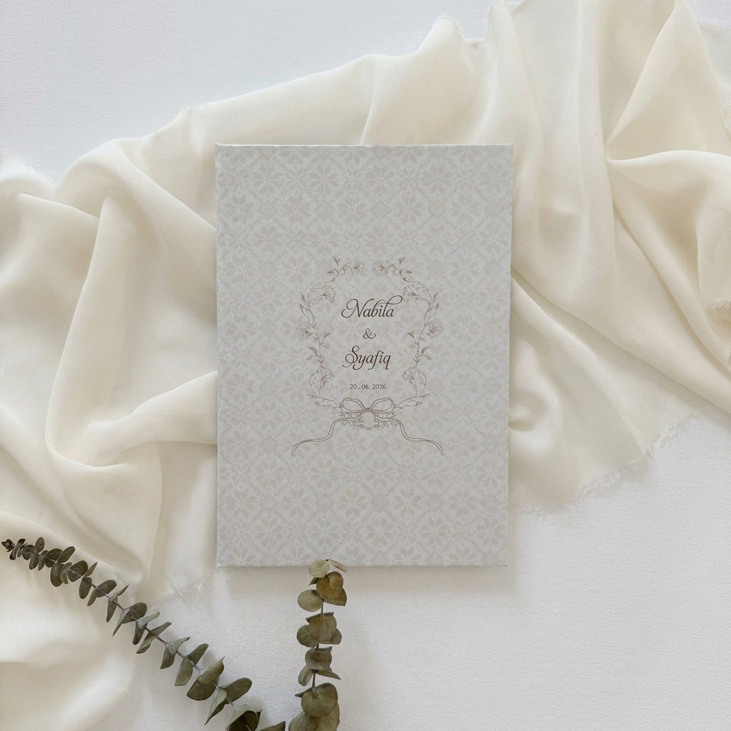 Hardcover wedding invitations offer a premium, book-like luxury presentation that makes a lasting statement for high-end ceremonies. Built on durable rigid chipboard, these invitations are often paired with high-end textures like matte laminate, velvet, or suede, and are finished with elegant hot foil stamping.