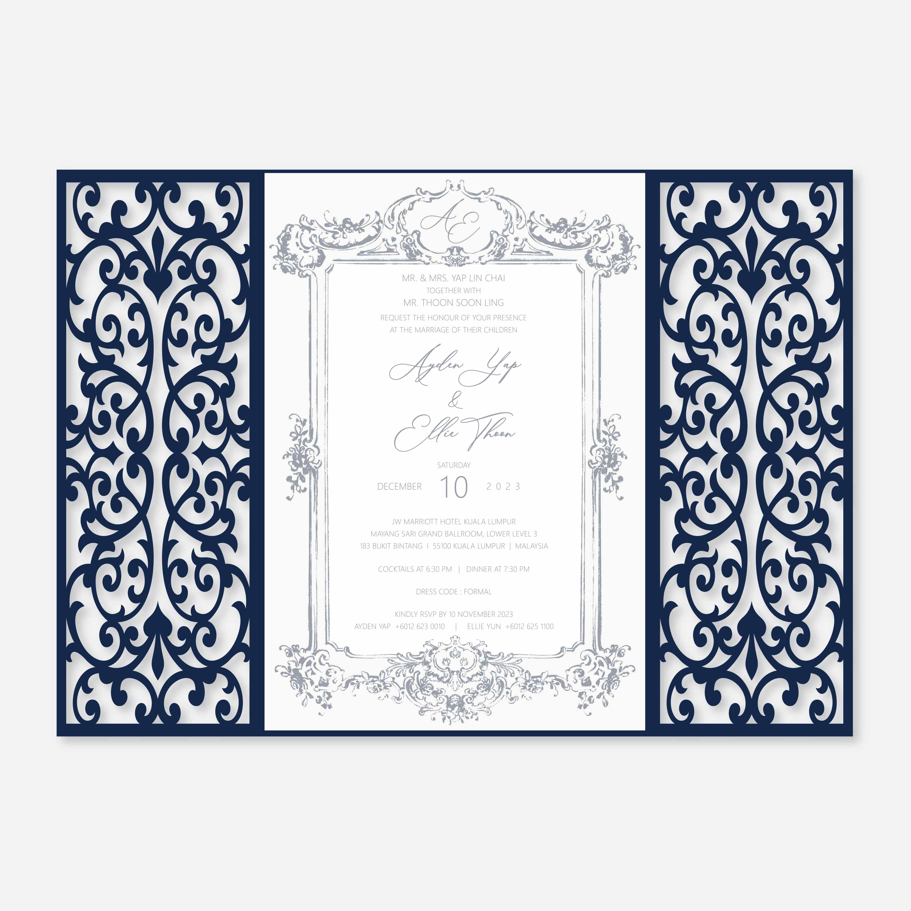 Navy blue and white laser-cut wedding invitation with intricate patterns