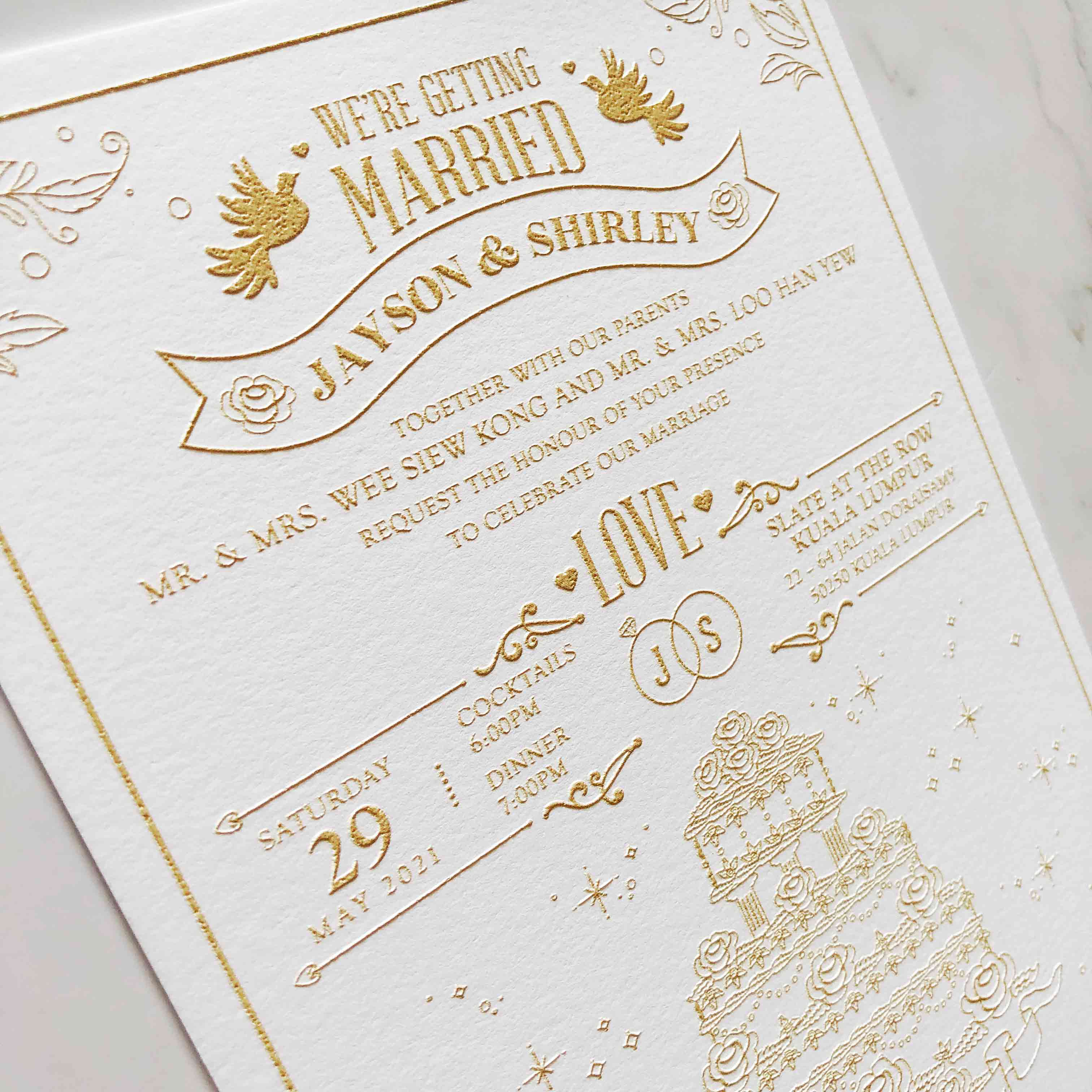 Wedding invitation card with gold raised text and design elements on a white background. It's look classy like letterpress but have it own special surface