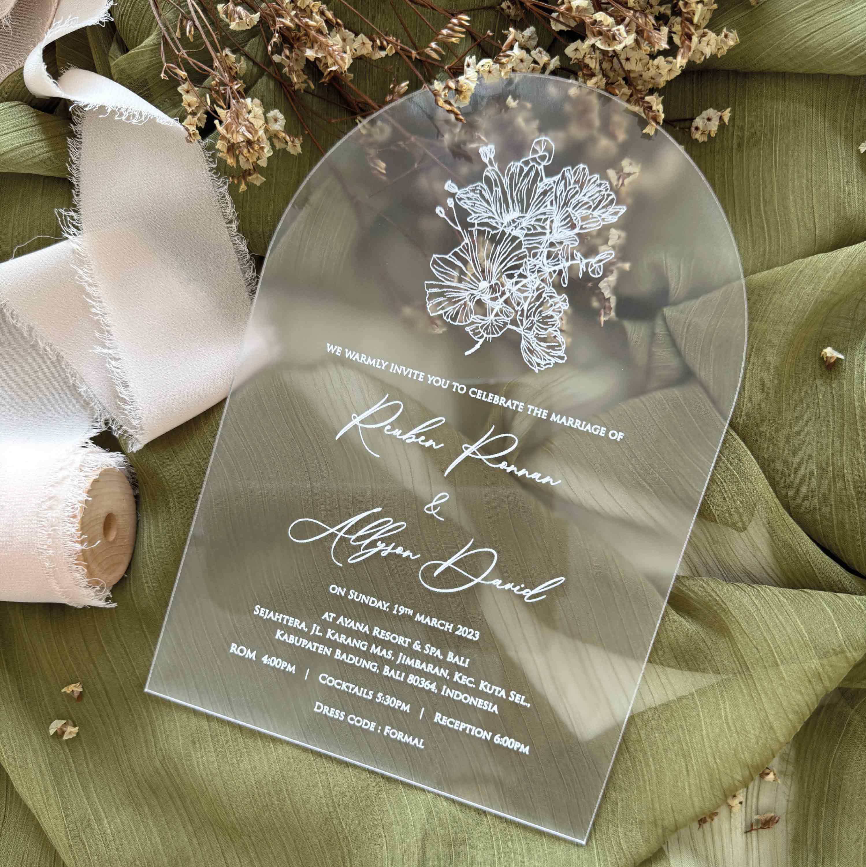 Frosted acrylic wedding invitation card with floral design printed in elegant white ink