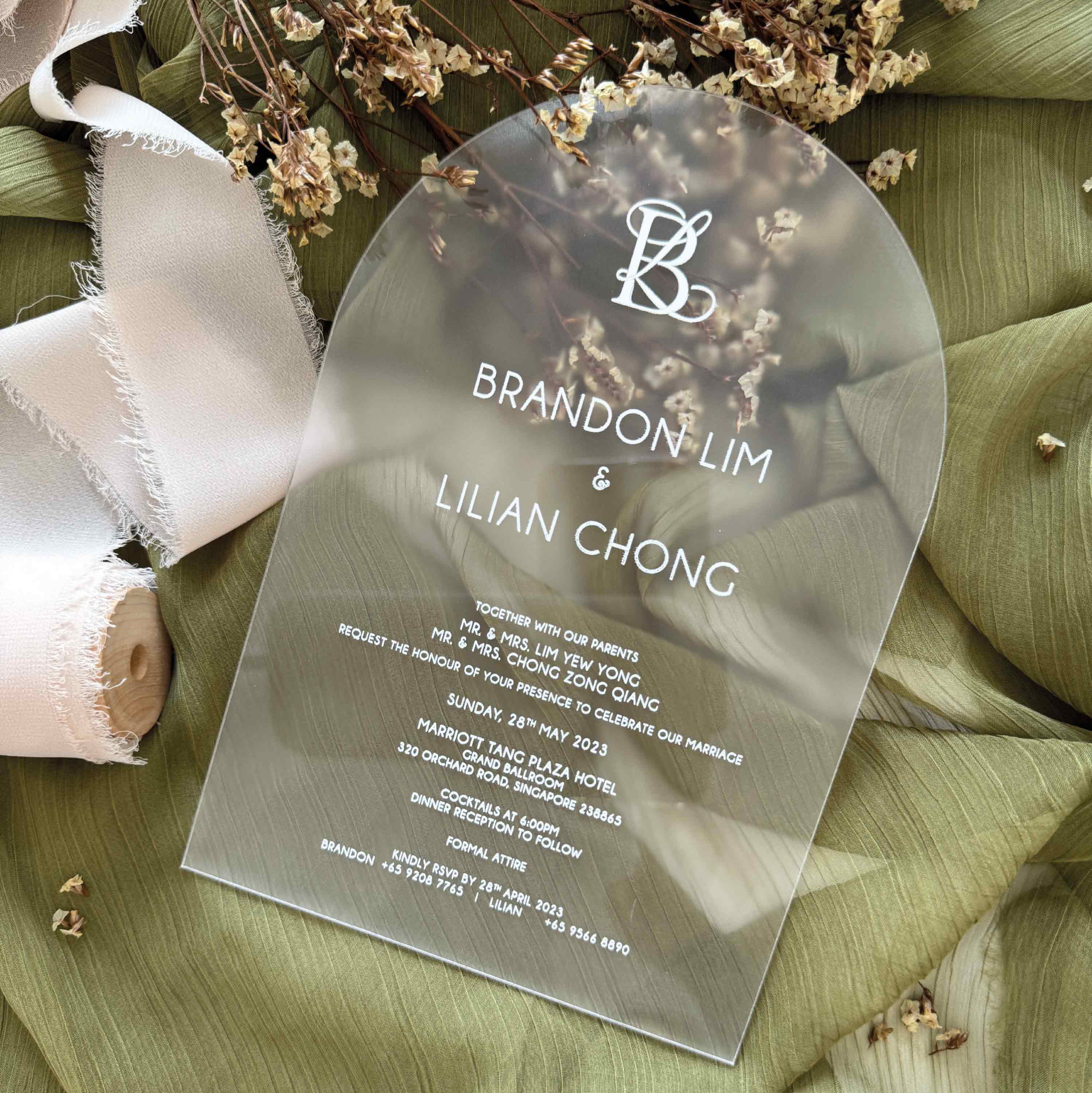 Frosted acrylic wedding invitation card with minimalist design printed in elegant white ink