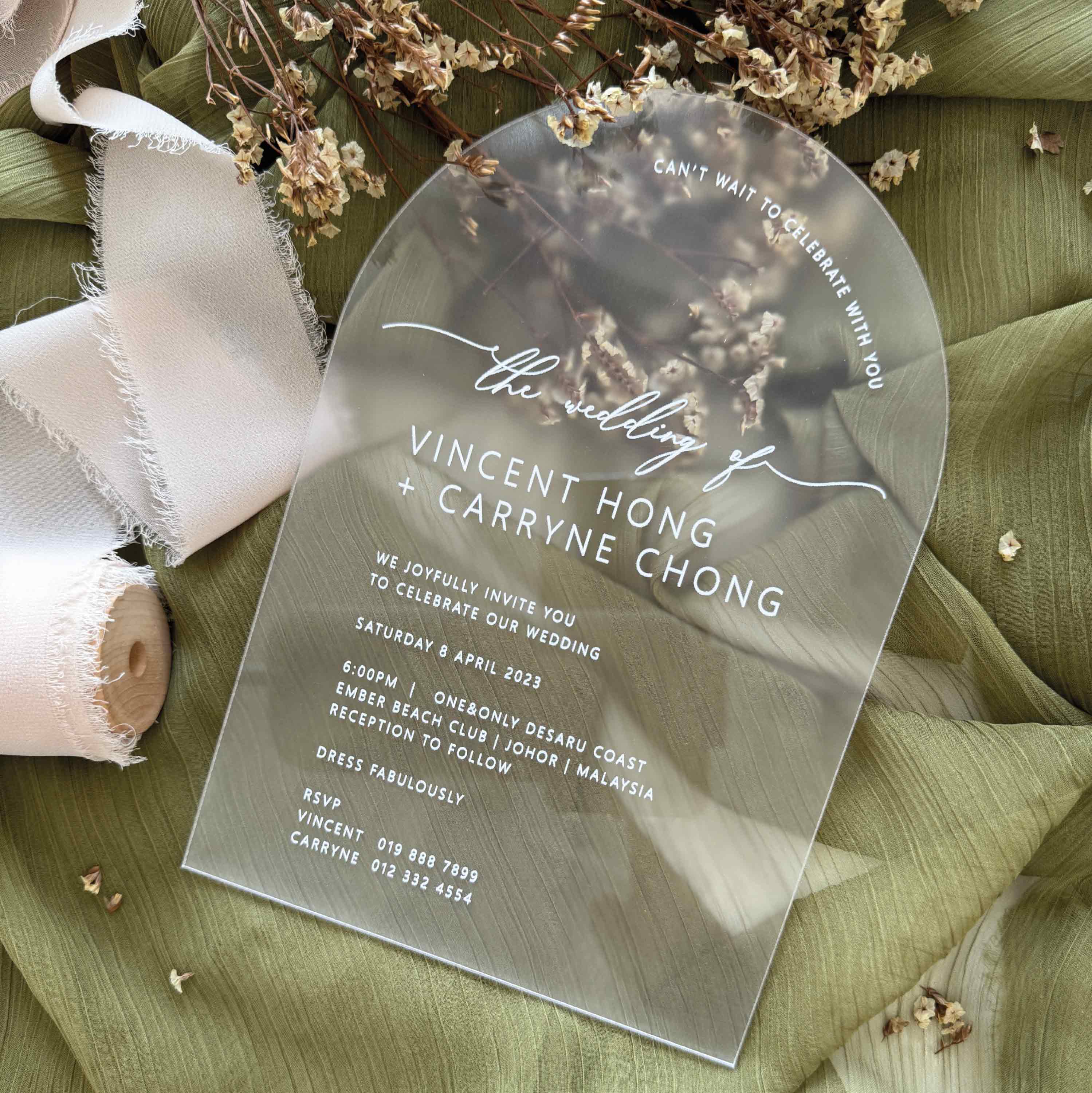 Wedding invitation card with elegant monogram design printed on arch shaped acrylic