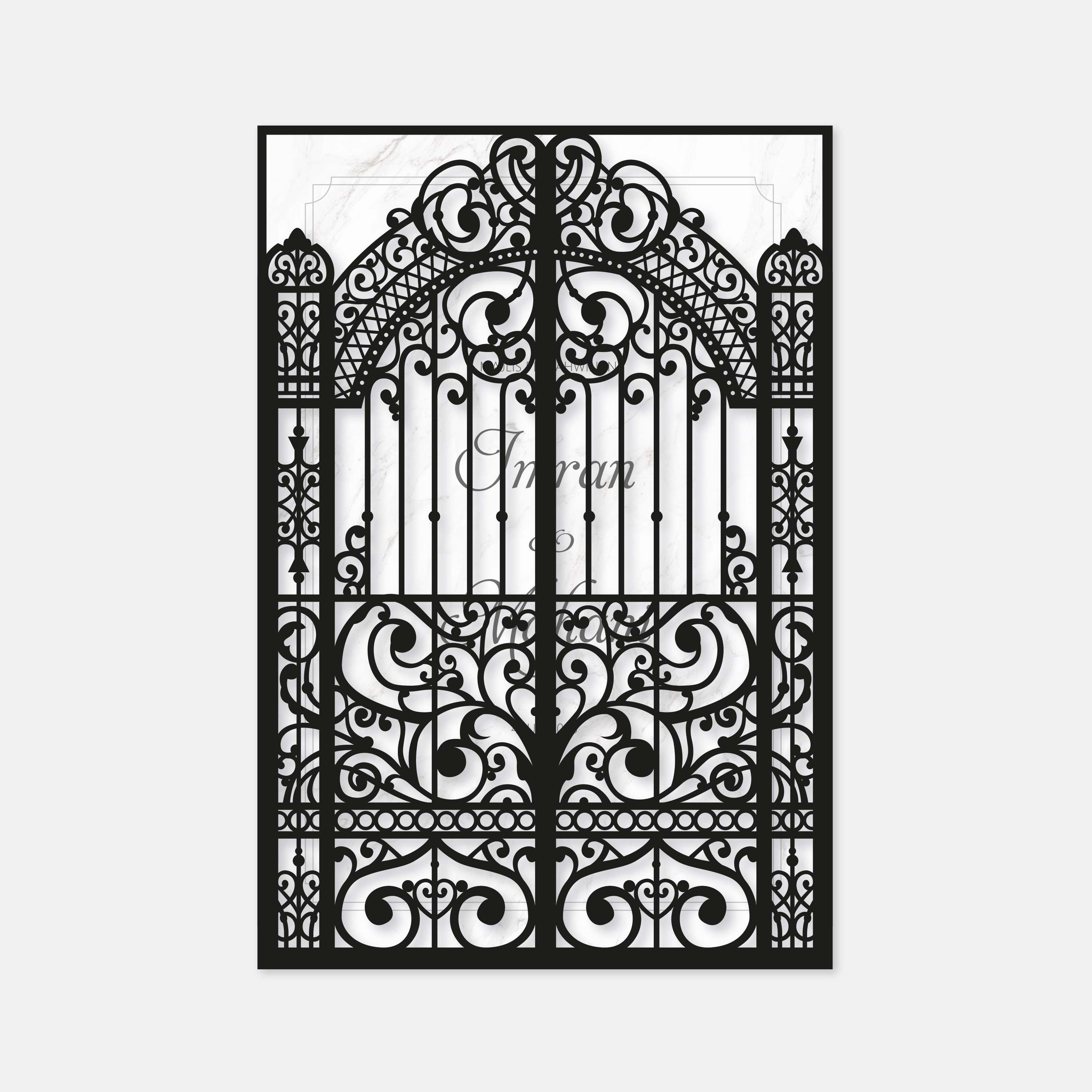 Decorative black metal gate with intricate designs on a white background