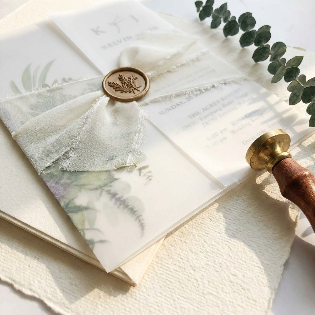 A chiffon ribbon wedding invitation provides a soft, ethereal, and organic aesthetic that perfectly complements elegant, fine-art, or bohemian wedding styles. Hand-frayed chiffon ribbons feature raw edges that add rich texture and motion to a stationary suite.